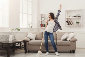 Woman cleaning inside home