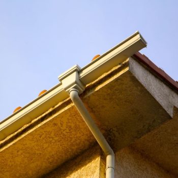 clogged gutters on residential home